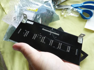 Swing brackets down.