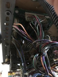 screws holding the playfield