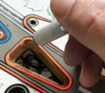 cleaning up the area around the insert